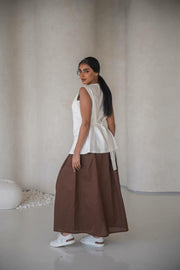 set consisting of a white vest and a brown skirt made of natural linen