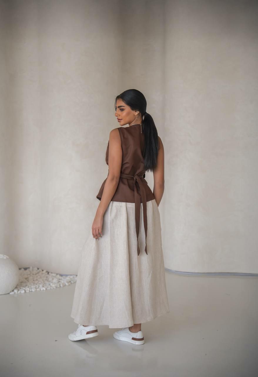 set consisting of a brown blouse with a beige skirt made of cool linen