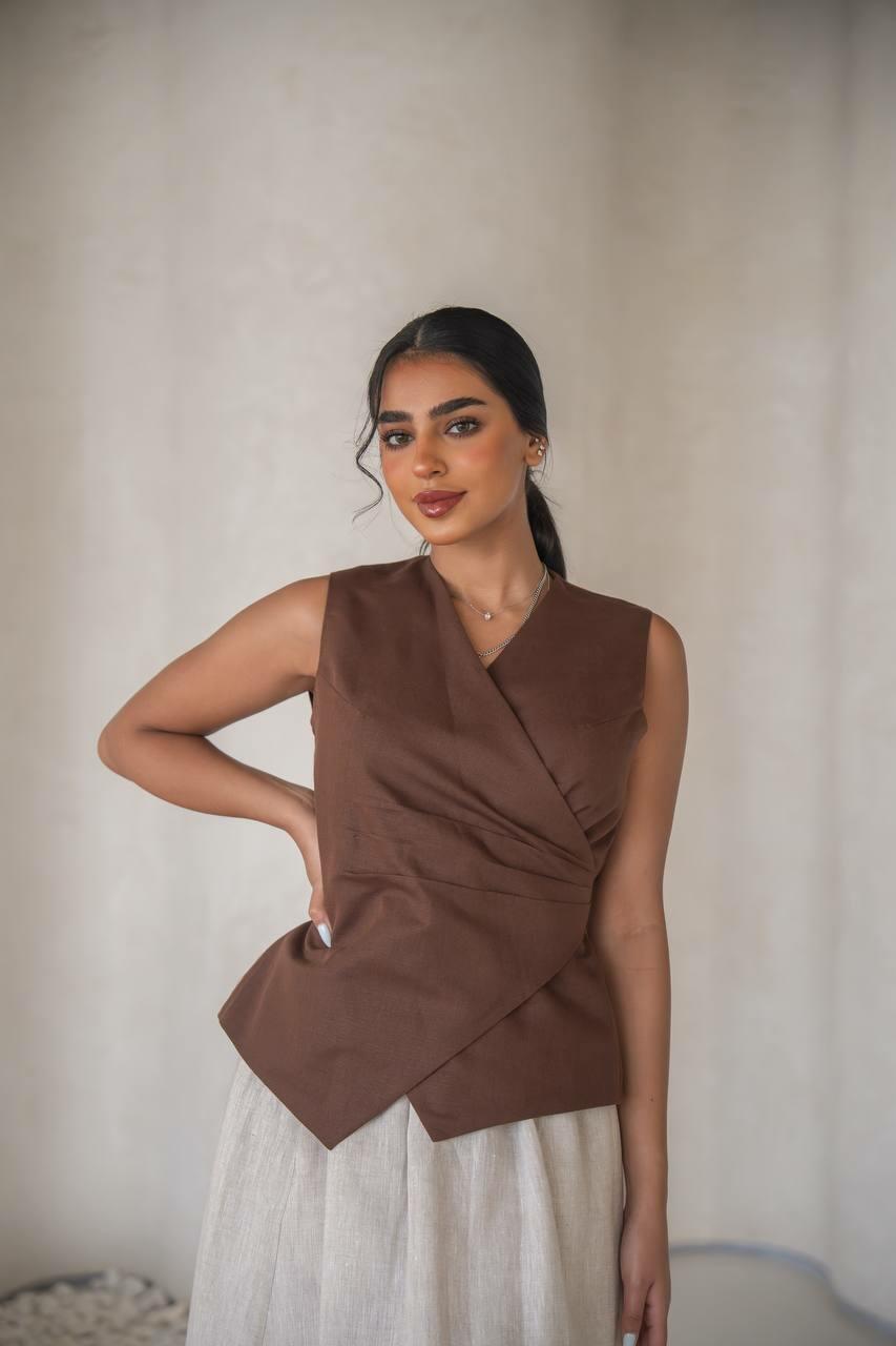 set consisting of a brown blouse with a beige skirt made of cool linen