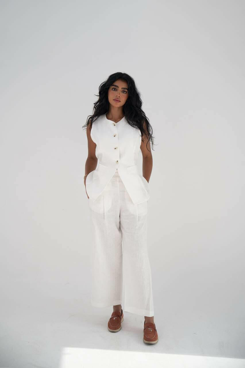A vest and pants set made of white linen