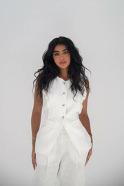 A vest and pants set made of white linen