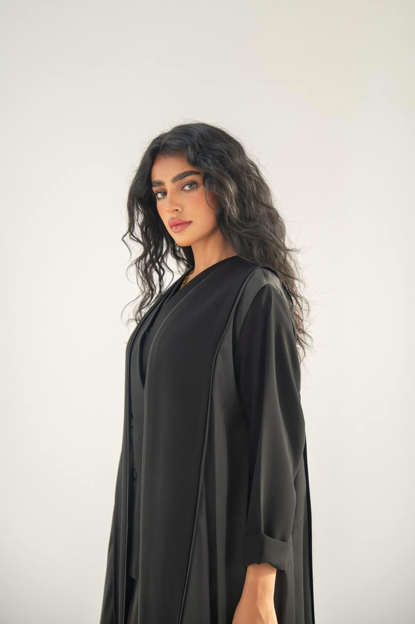 Black crepe and silk crepe with embroidery on the back