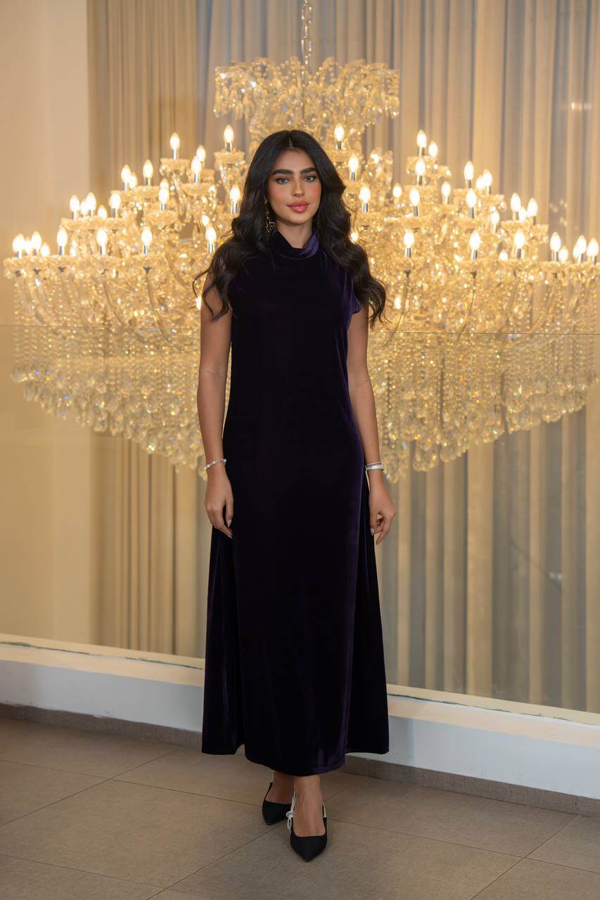 Purple velvet dress.