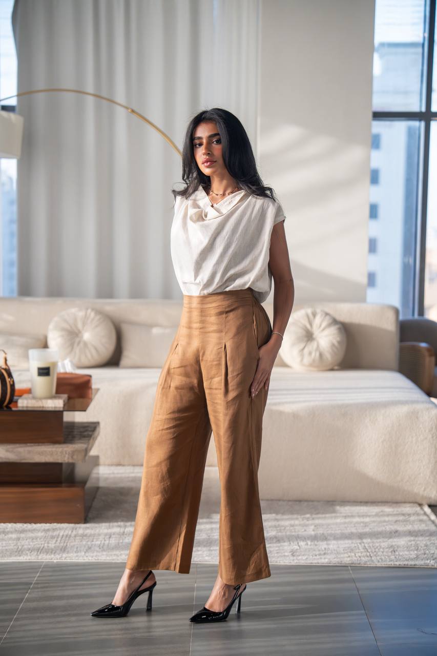 Light beige blouse and camel pants set, made of linen.