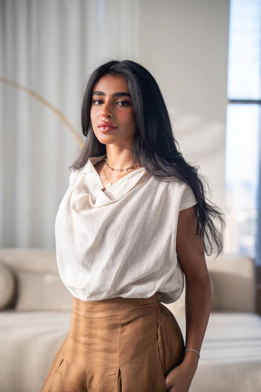 Light beige blouse and camel pants set, made of linen.