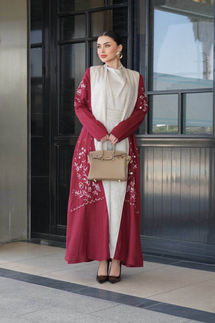 Burgundy linen abaya with hand-stitched details