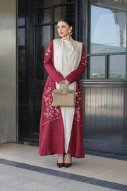 Burgundy linen abaya with hand-stitched details