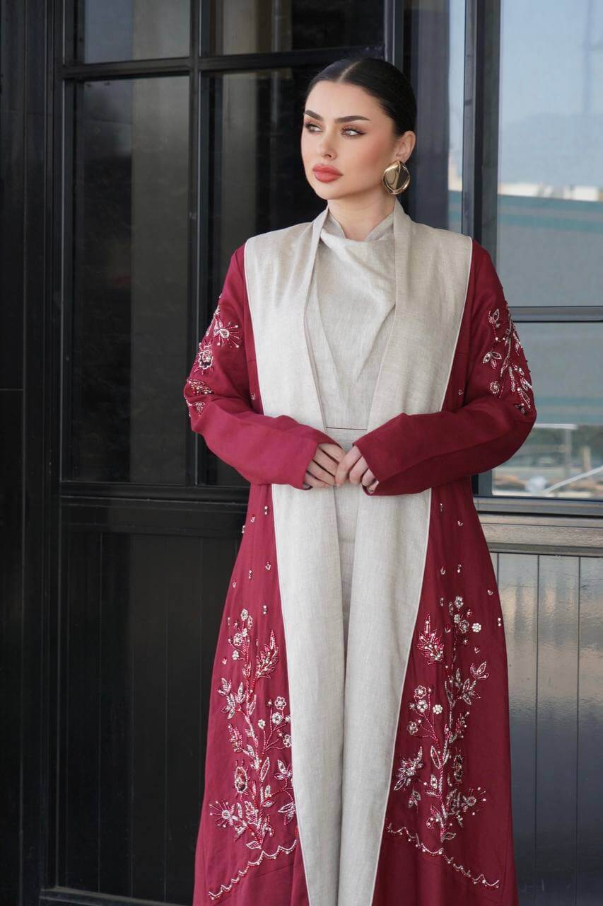 Burgundy linen abaya with hand-stitched details