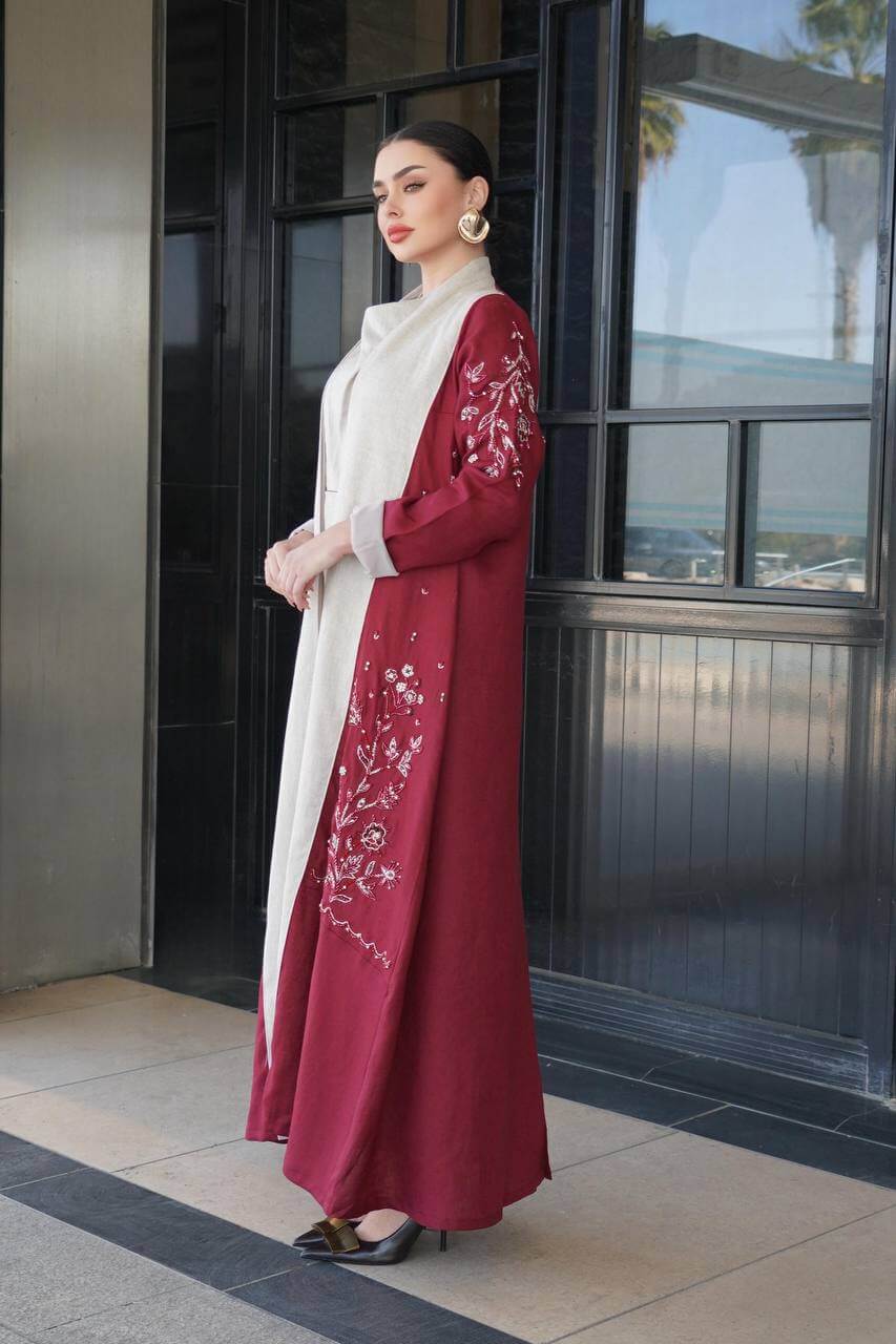 Burgundy linen abaya with hand-stitched details