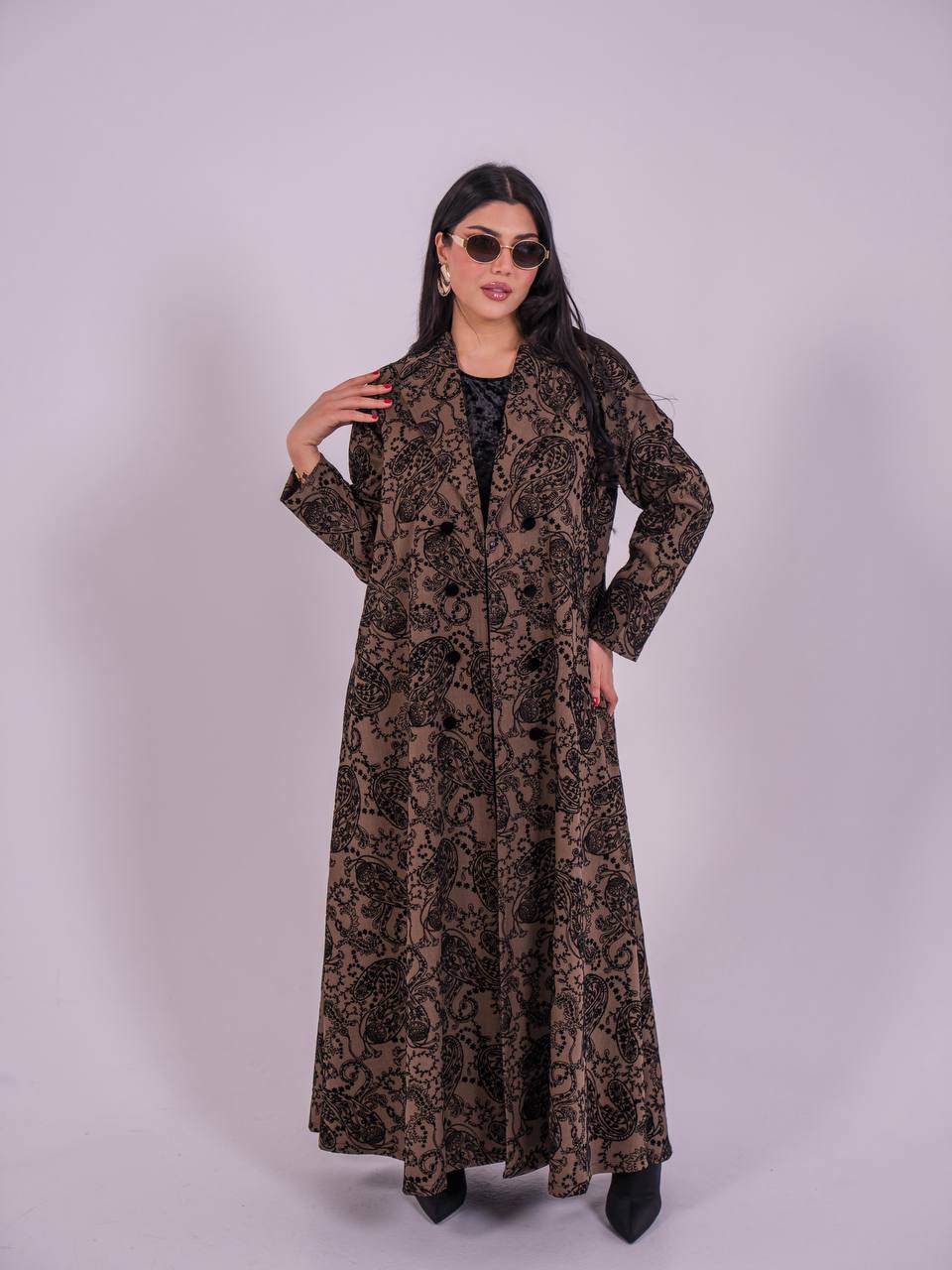 A brown abaya made of crepe fabric with a velvet print.C:6732