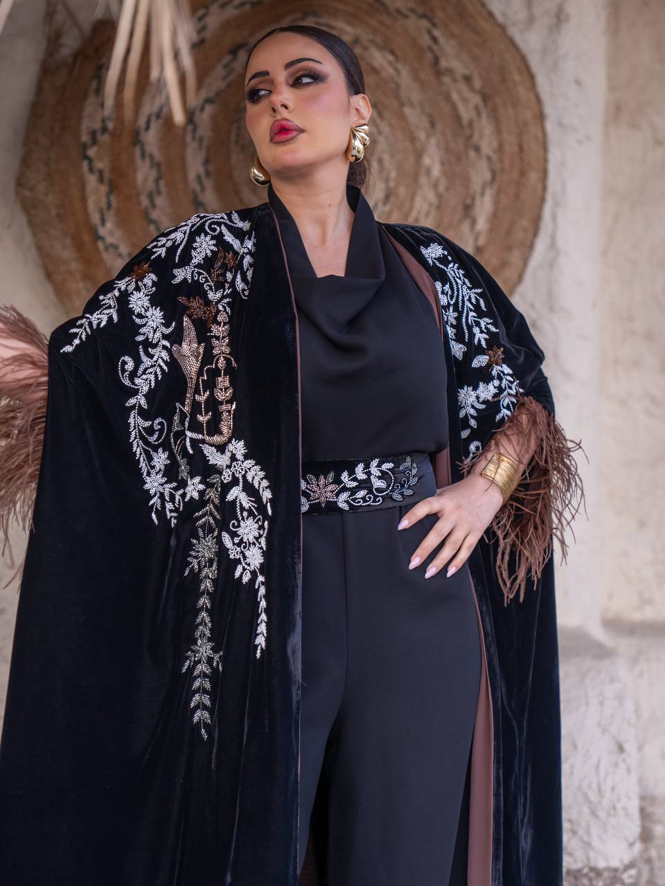 Velvet bisht and jumpsuit set in black with hand embellishment.C:6719
