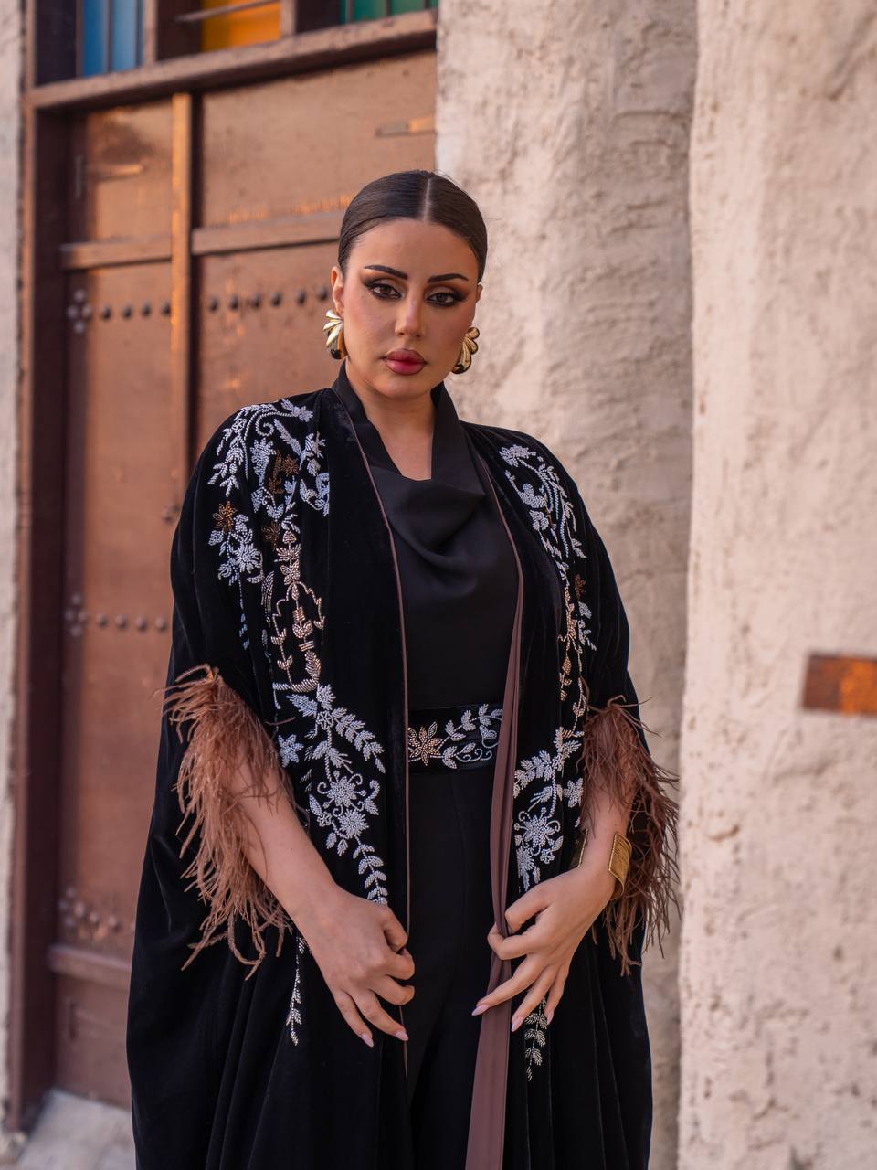 Velvet bisht and jumpsuit set in black with hand embellishment.C:6719