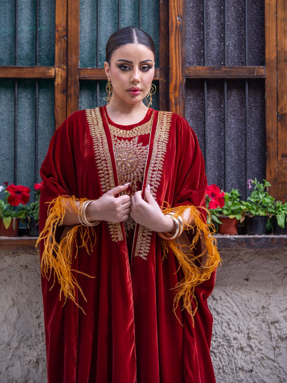 Bisht and dress set in burgundy velvet with hand embellishment.C:6714