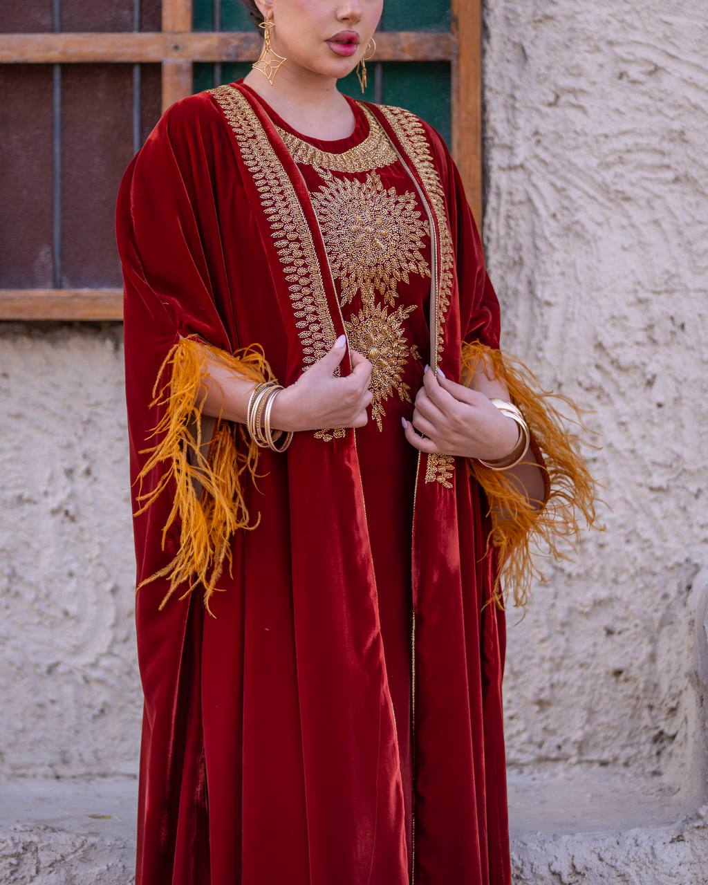 Bisht and dress set in burgundy velvet with hand embellishment.C:6714