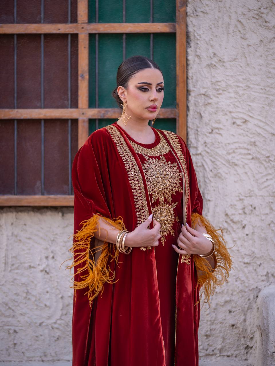 Bisht and dress set in burgundy velvet with hand embellishment.C:6714