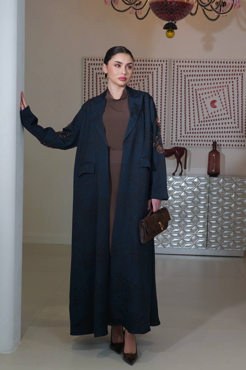 A navy blue jacquard silk blazer abaya with hand-stitched details.C:6754