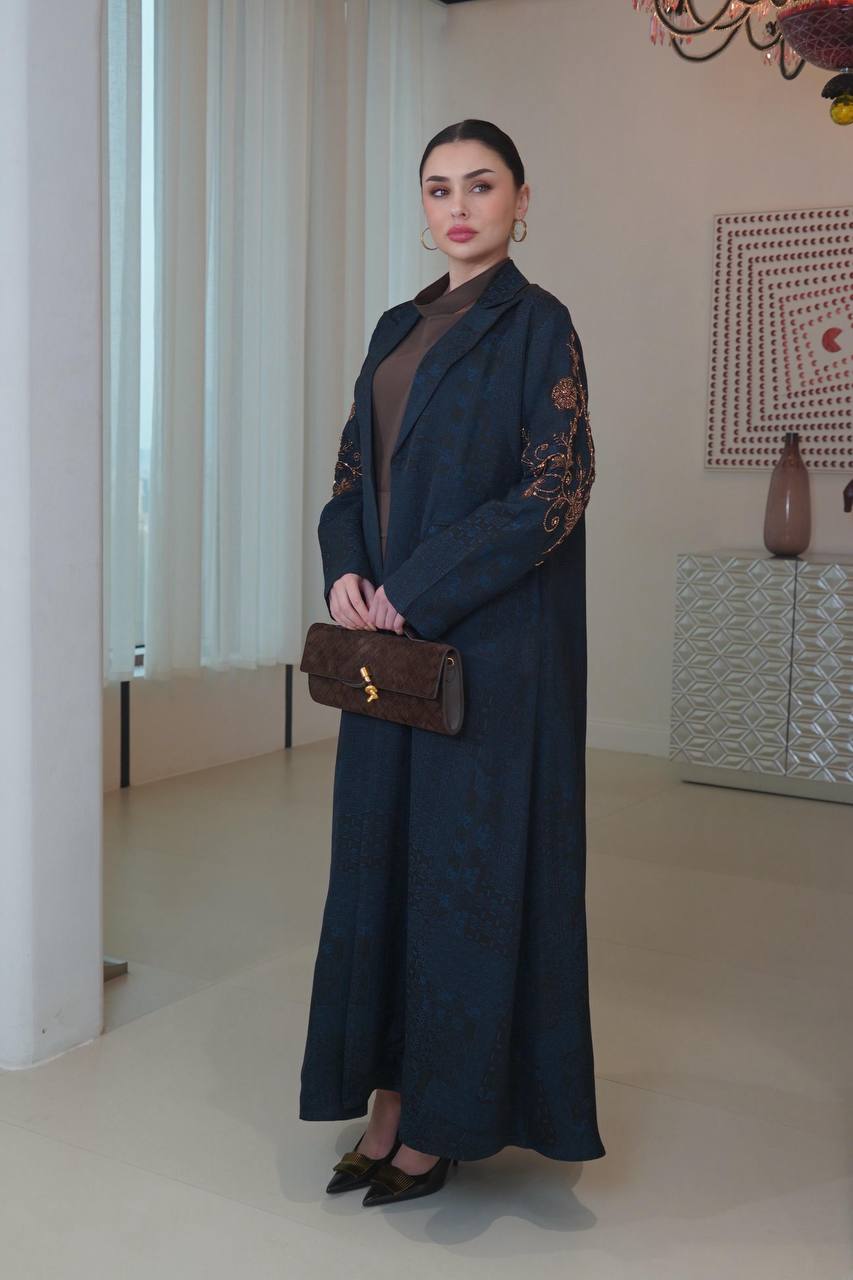 A navy blue jacquard silk blazer abaya with hand-stitched details.C:6754