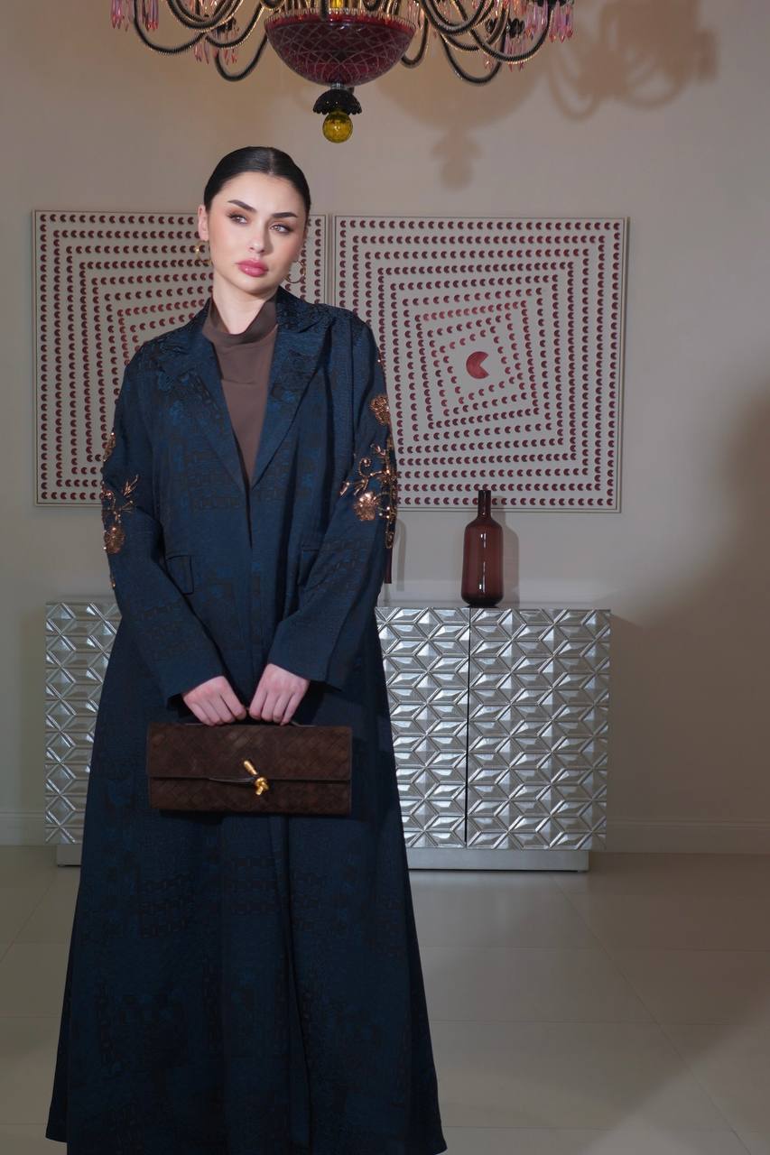 A navy blue jacquard silk blazer abaya with hand-stitched details.C:6754